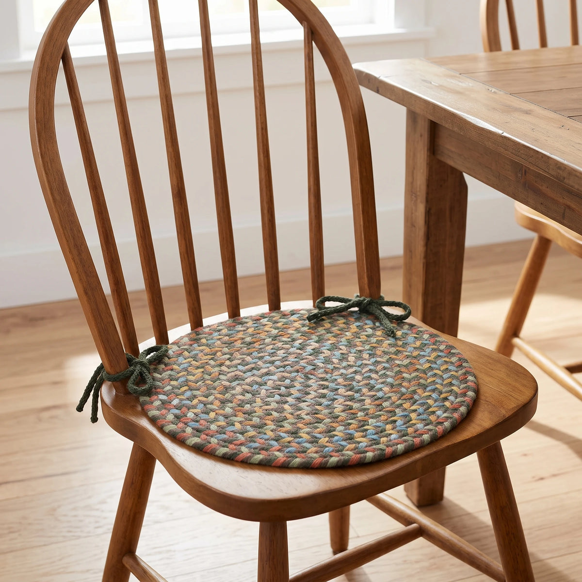 Confetti Braided Chair Pad - Dark Taupe - tied on a wooden Windsor dining chair