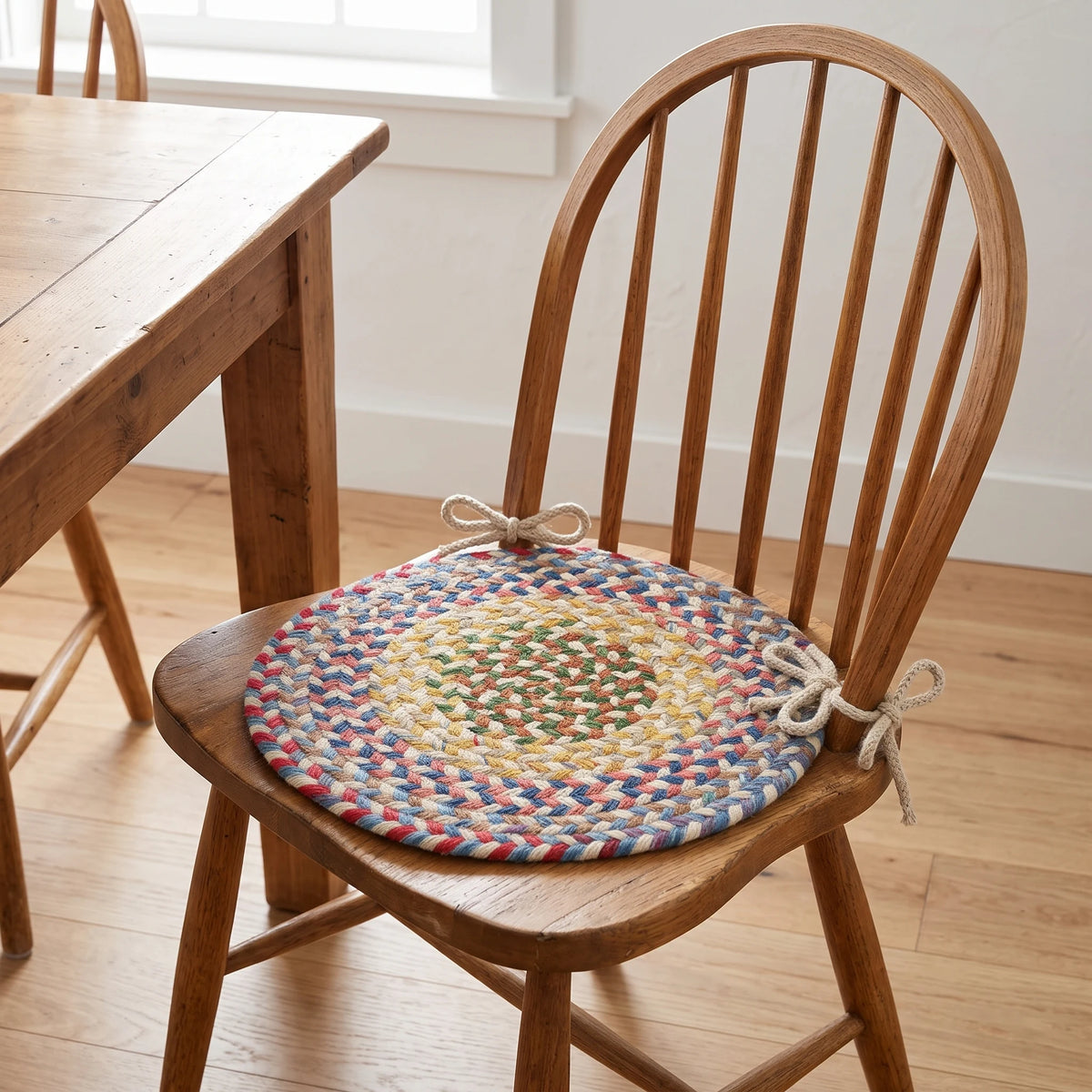 Gemstone Braided Chair Pad - Champagne - tied on a wooden Windsor dining chair