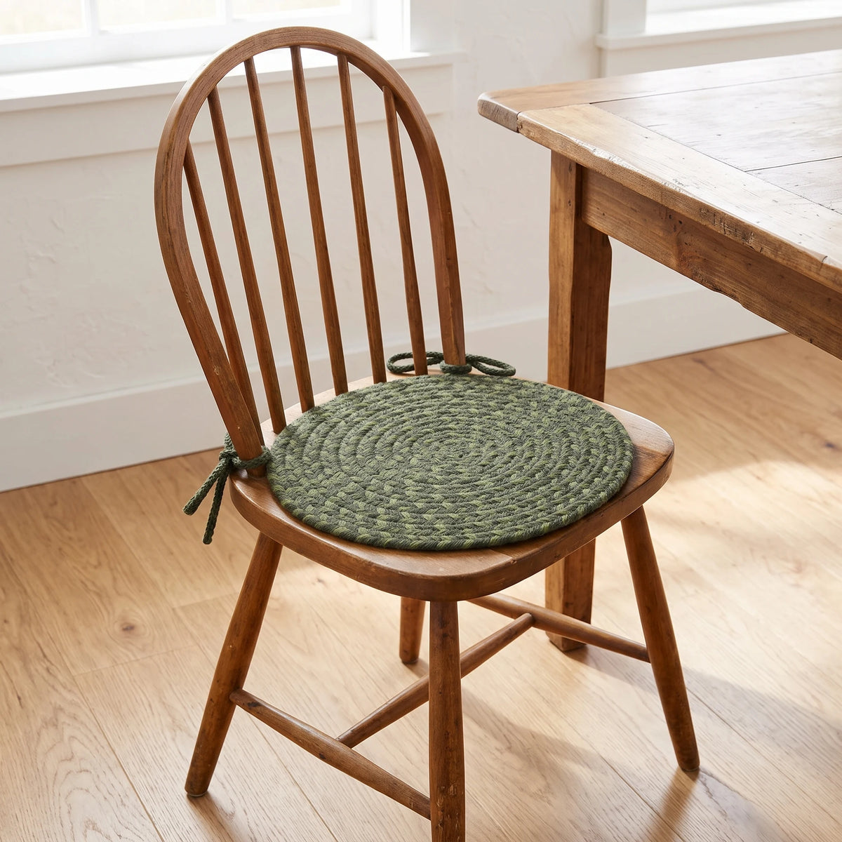 Homespun Braided Chair Pad - Greenmarket - tied on a wooden Windsor dining chair
