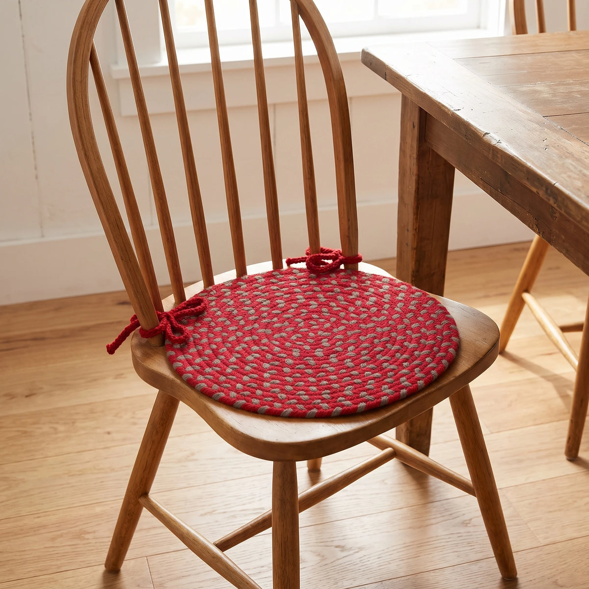 Homespun Braided Chair Pad - Red Brick - tied on a wooden Windsor dining chair