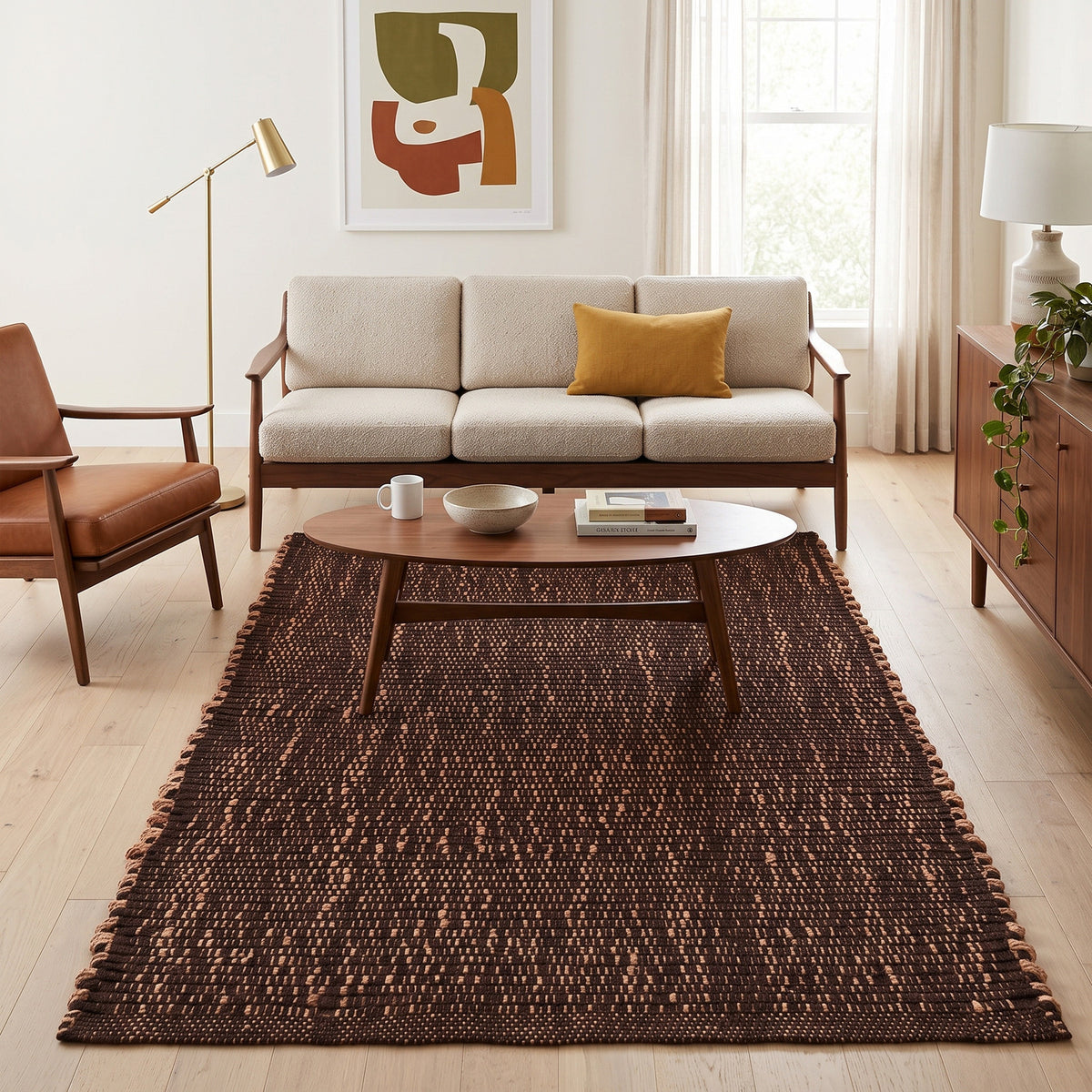 Terra brown jute and cotton rug, 5' x 7', in a living room