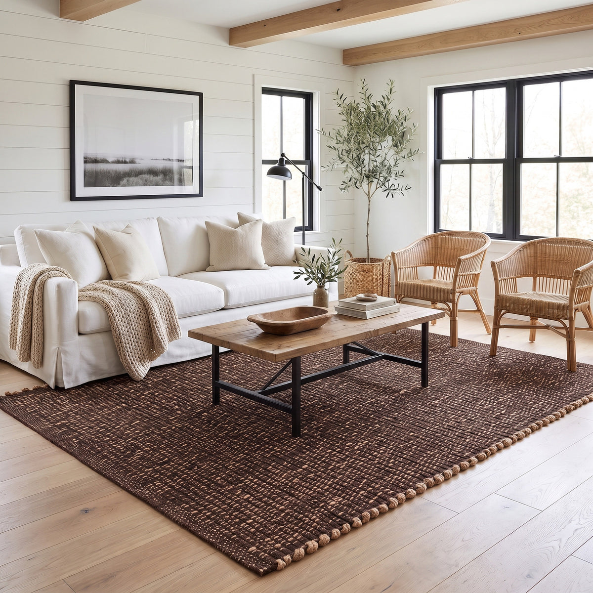 Terra brown jute and cotton rug, 6' x 9', in a living room