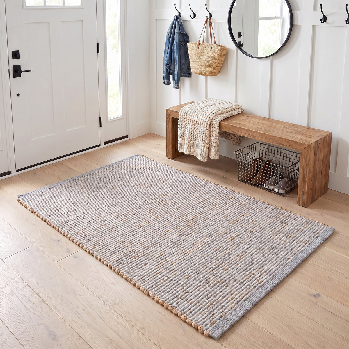 Terra light gray jute and cotton rug, 3' x 5', in an entryway