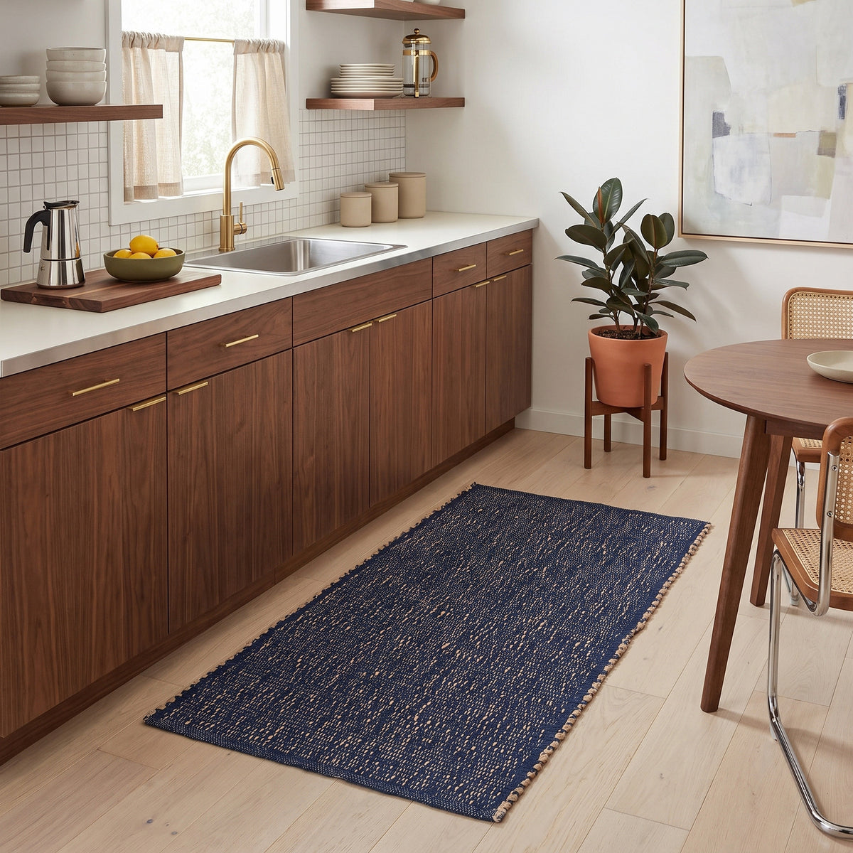 Terra navy jute and cotton runner rug, 2' x 4', in a mid-century modern galley kitchen