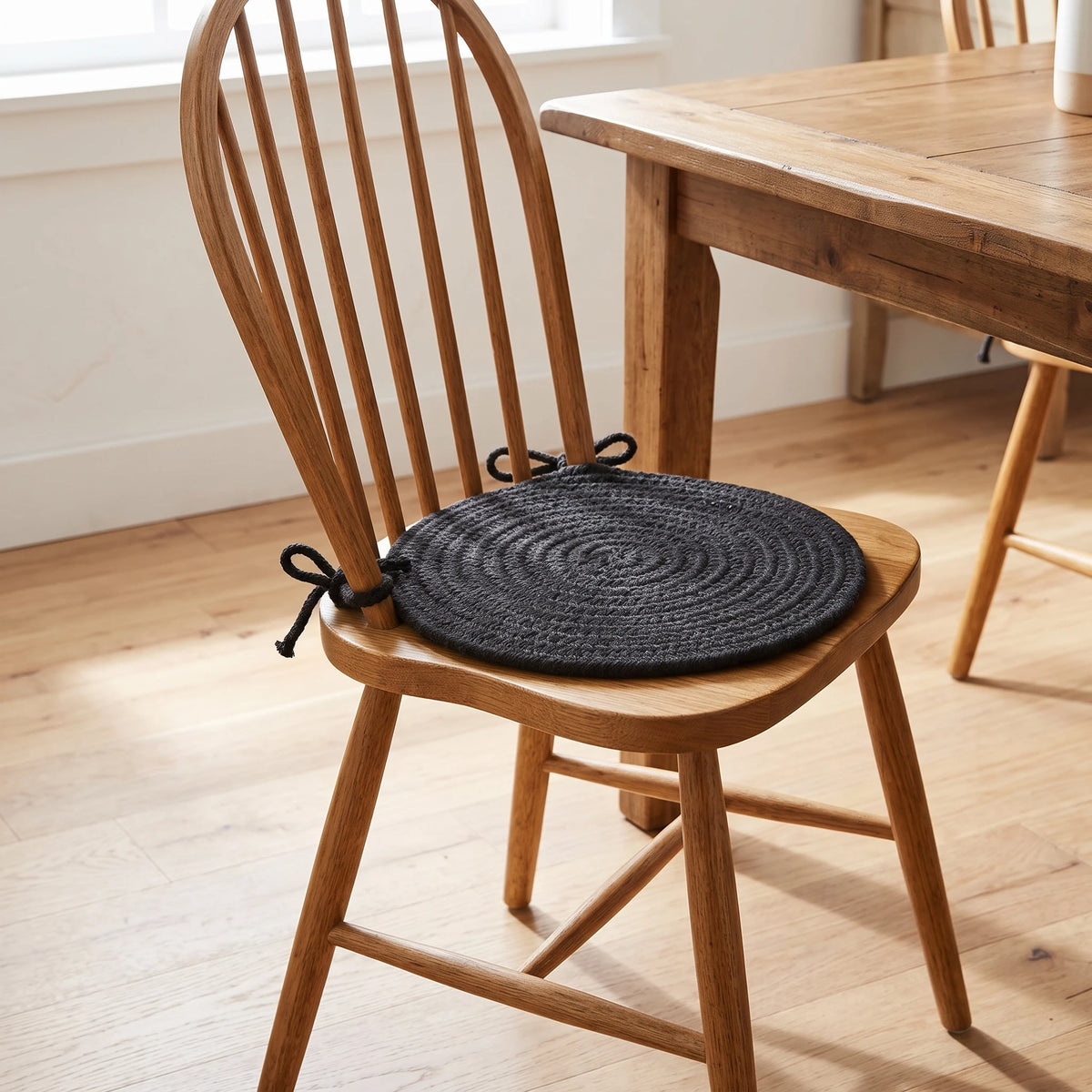 Pura Braided Chair Pad - Black - tied on a wooden Windsor dining chair