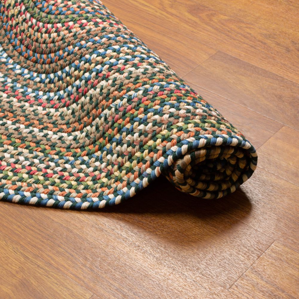 Roxbury Spruce Green braided rug rolled to show the braid construction