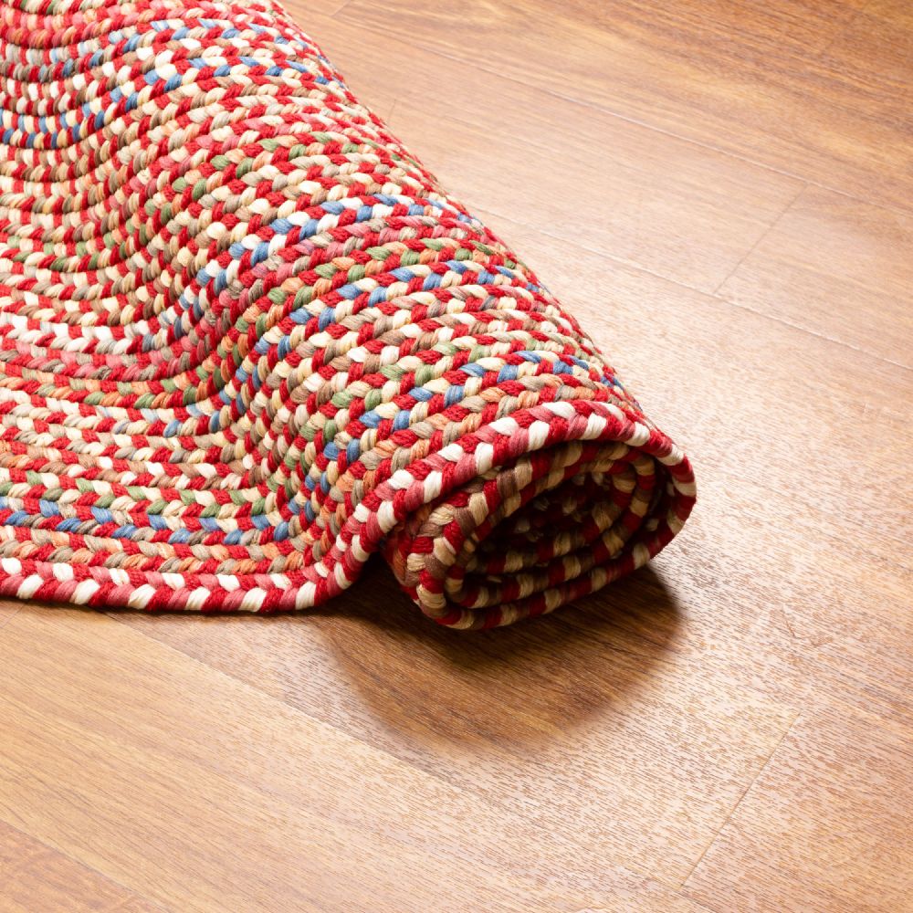 Roxbury Red braided rug rolled to show the braid construction