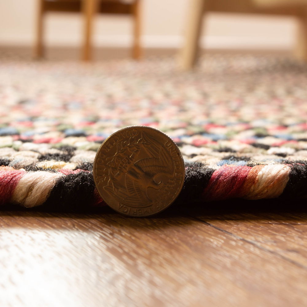 Roxbury Charcoal braided rug, close up of the braided edge
