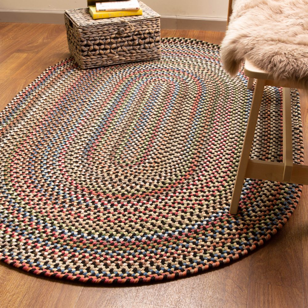 Roxbury Charcoal braided rug styled in a room setting
