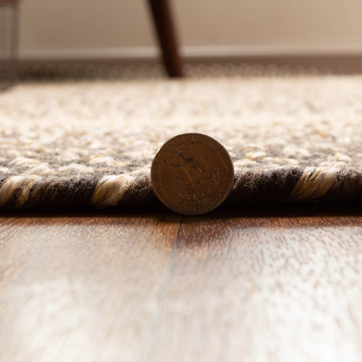 Ridgewood brown braided wool rug - edge detail showing the finished braided border