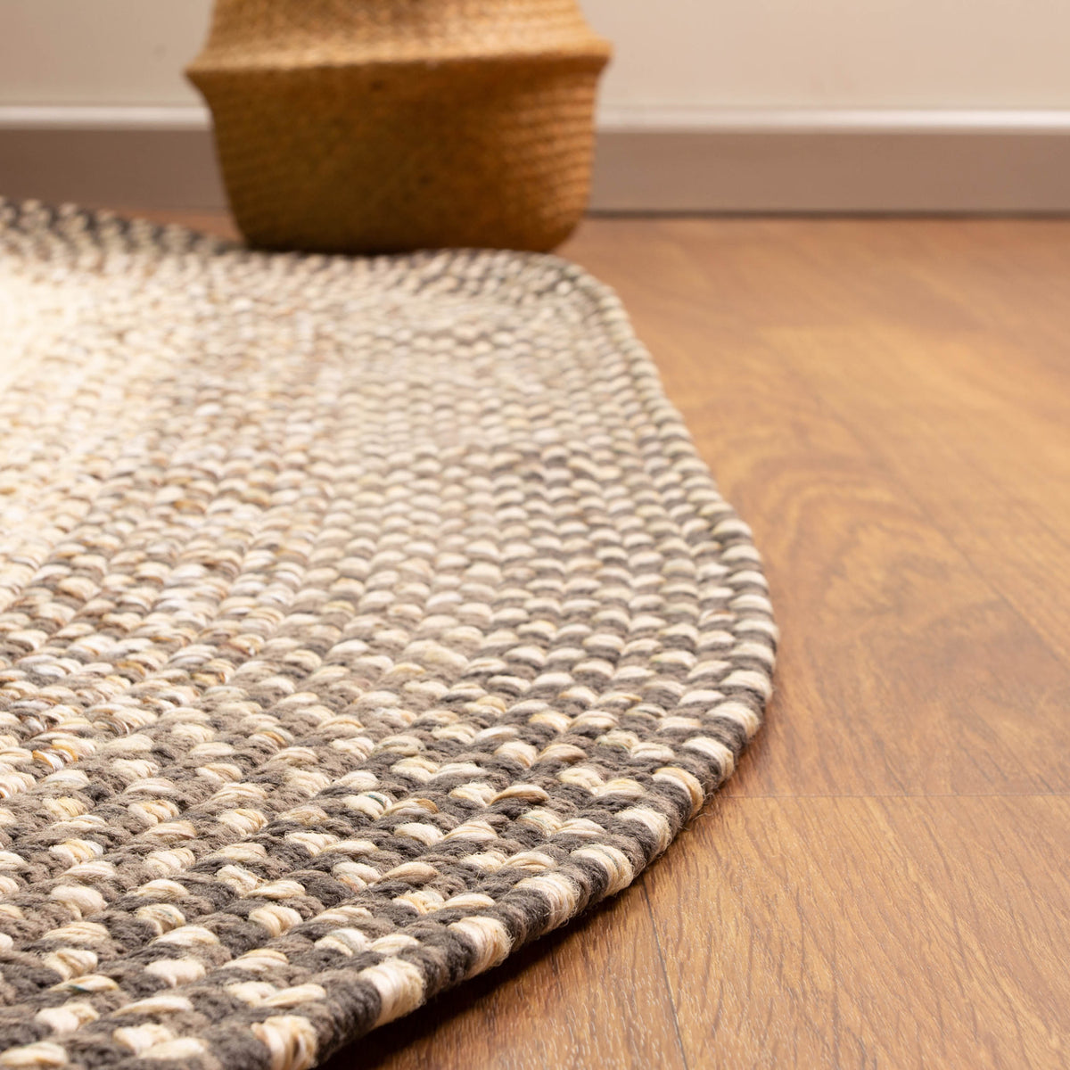 Ridgewood brown braided wool rug styled in a farmhouse room setting