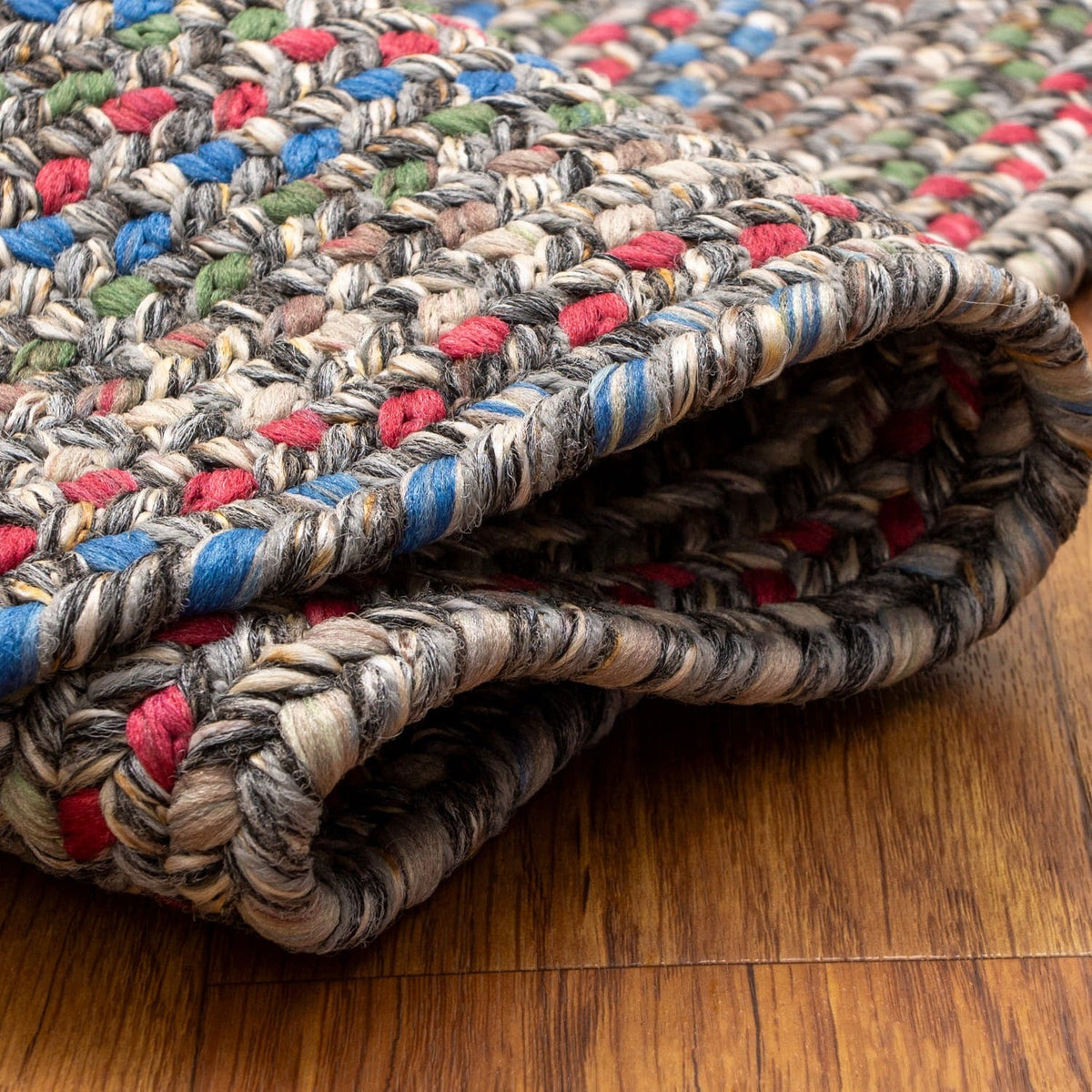 Gray & Brown Portsmouth rug folded back to show the reversible underside