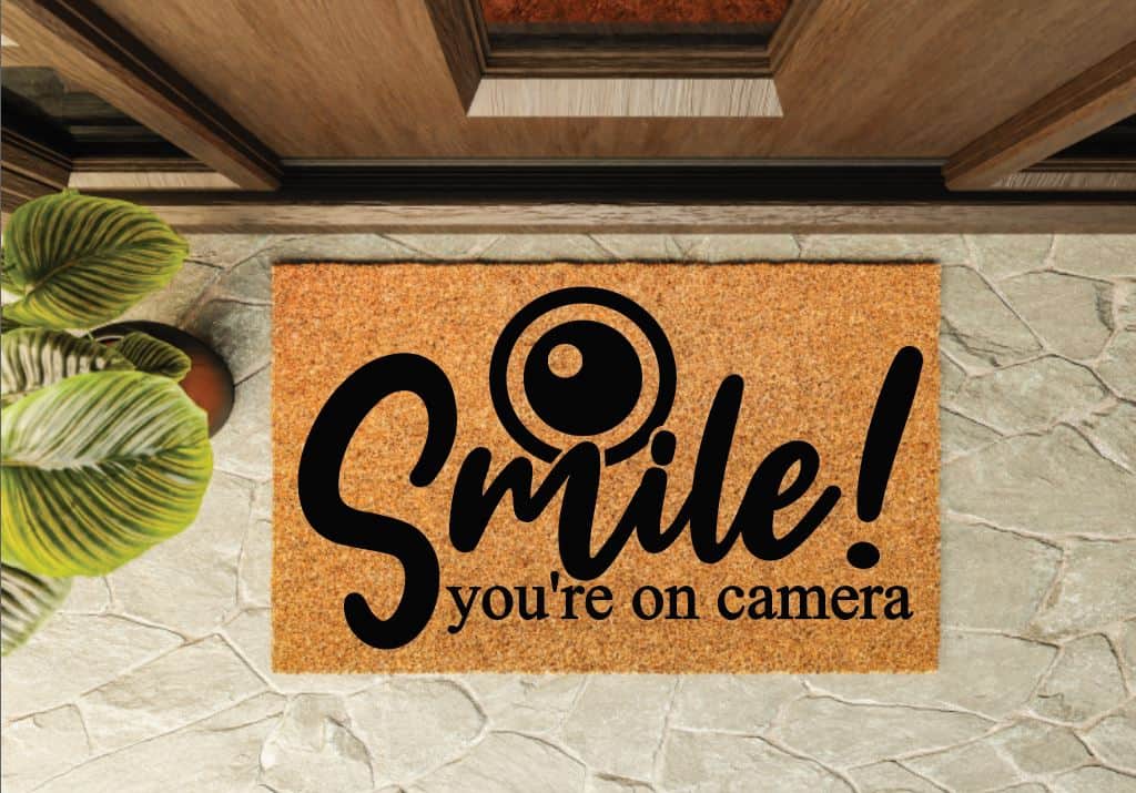 Smile You're On Camera Welcome Mat