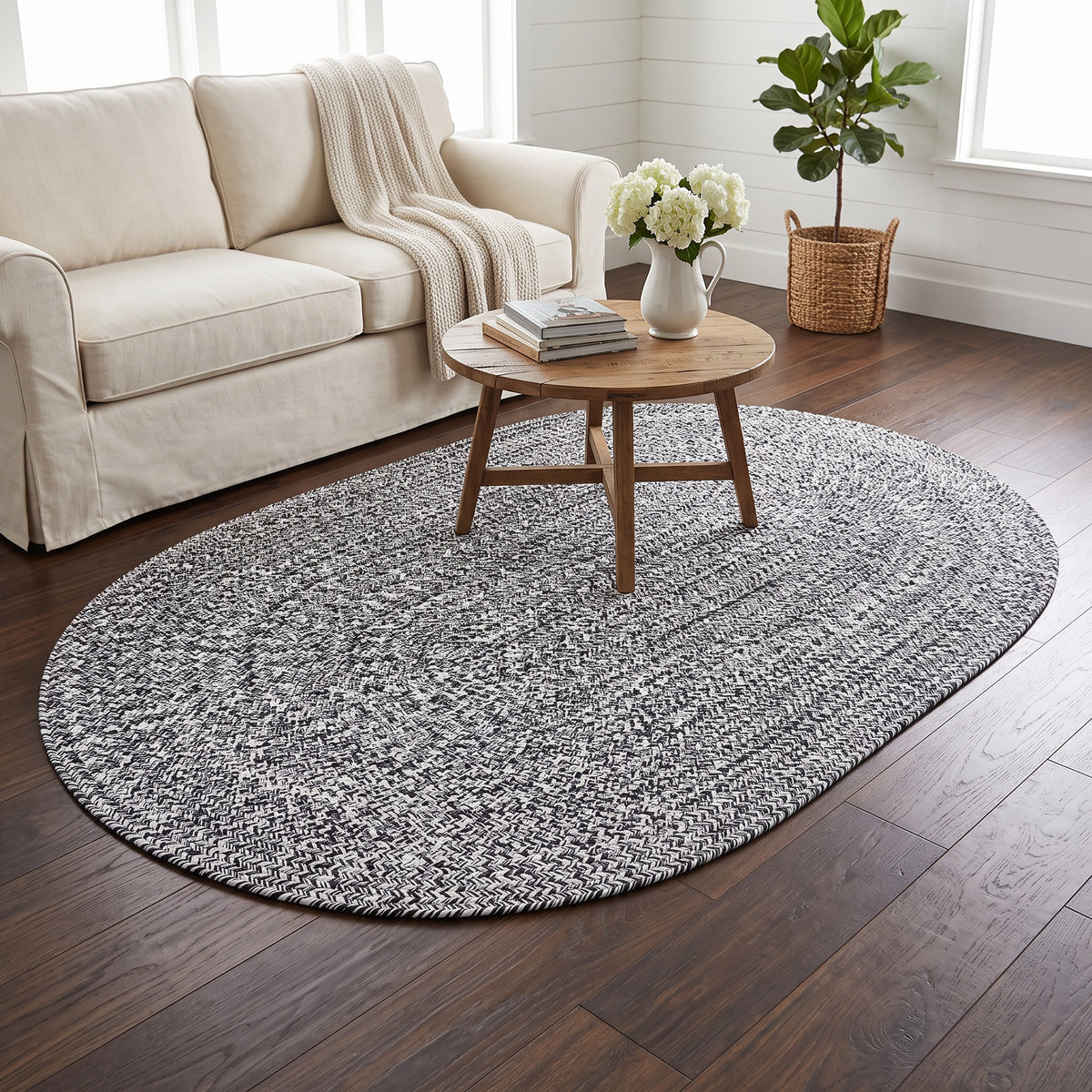 Rustica black and white braided cotton rug, 4x6 oval under a coffee table #size_4' x 6' Oval