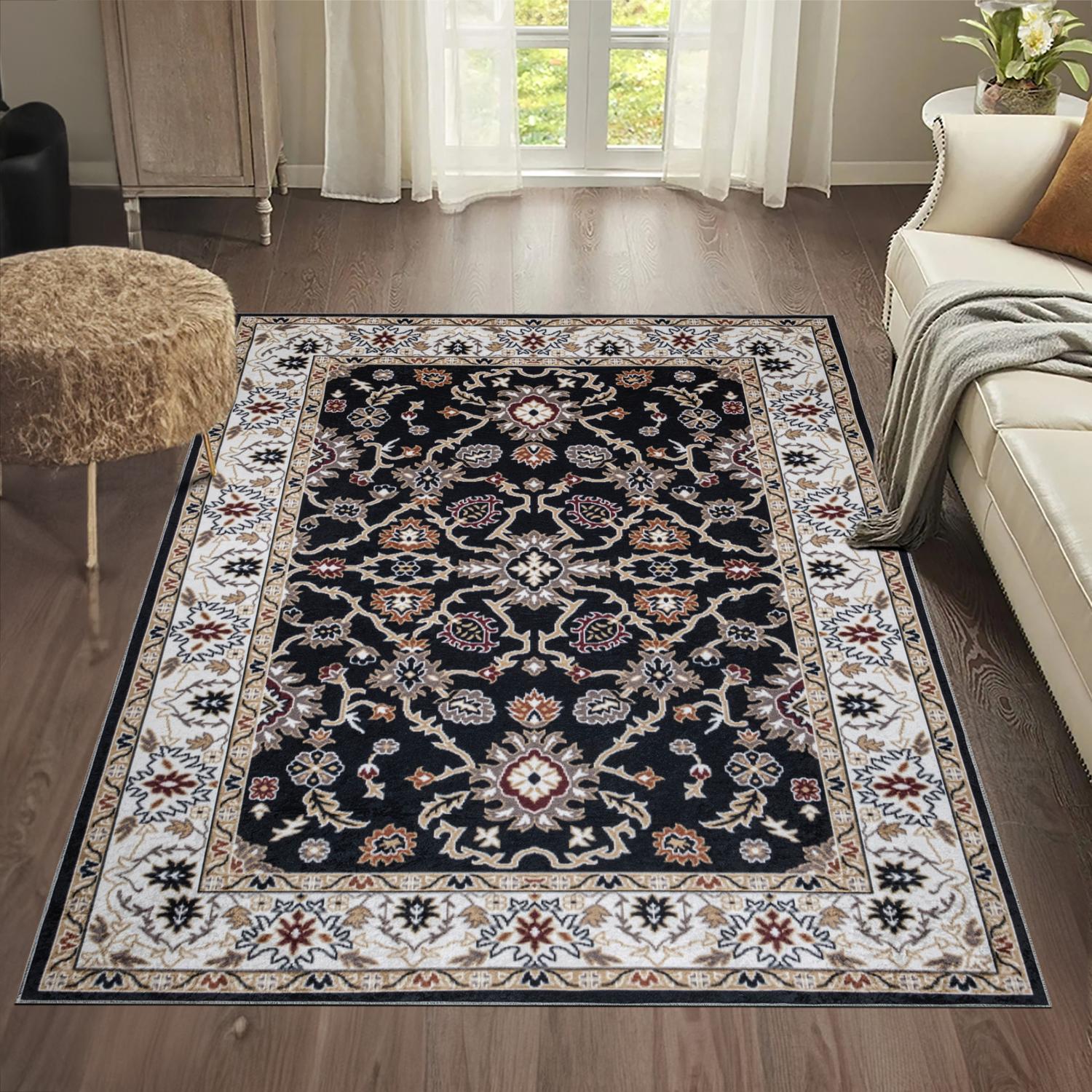 Black Bursa machine washable area rug 4' x 6' - styled in a room setting