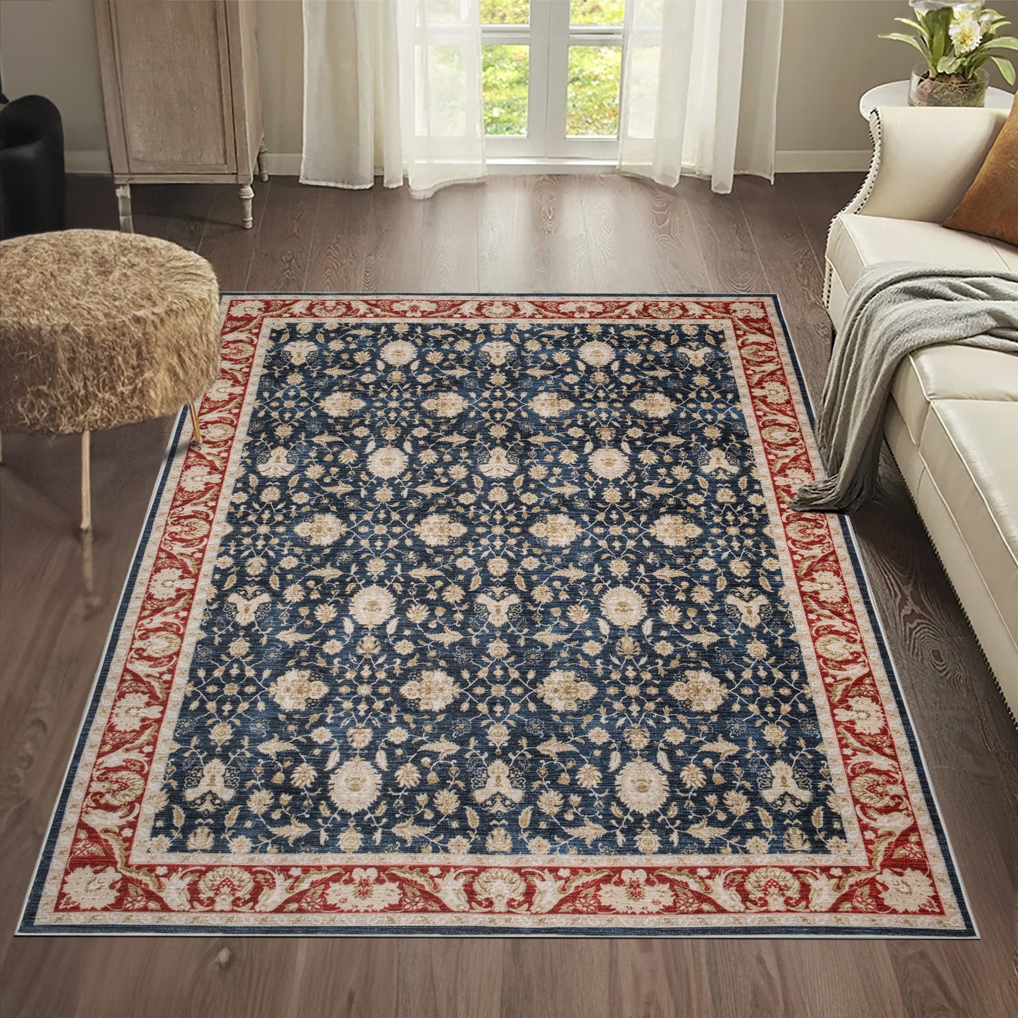 Navy Konya machine washable area rug 2' x 3' - styled in a room setting