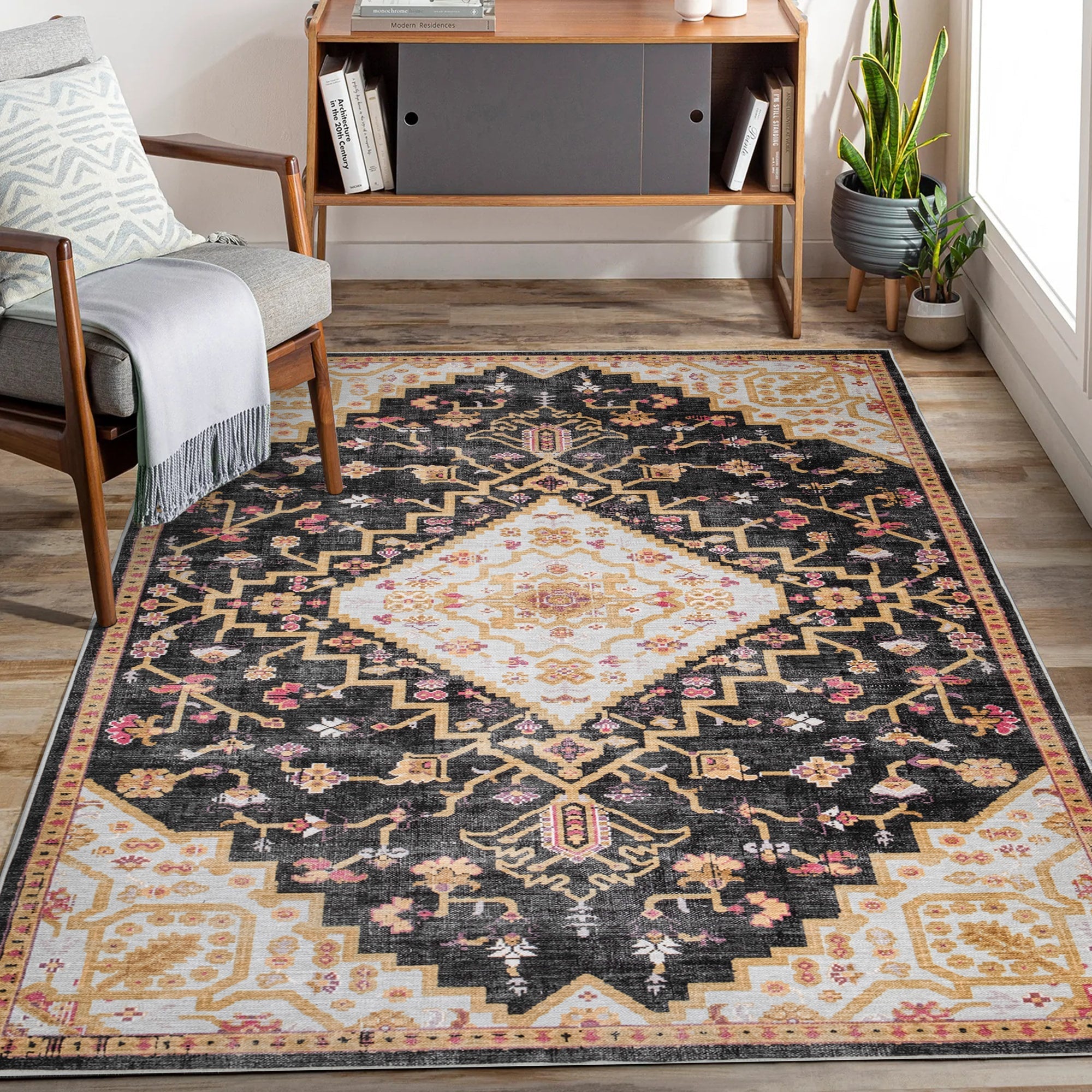 Charcoal Konya machine washable area rug 2' x 3' - styled in a living room