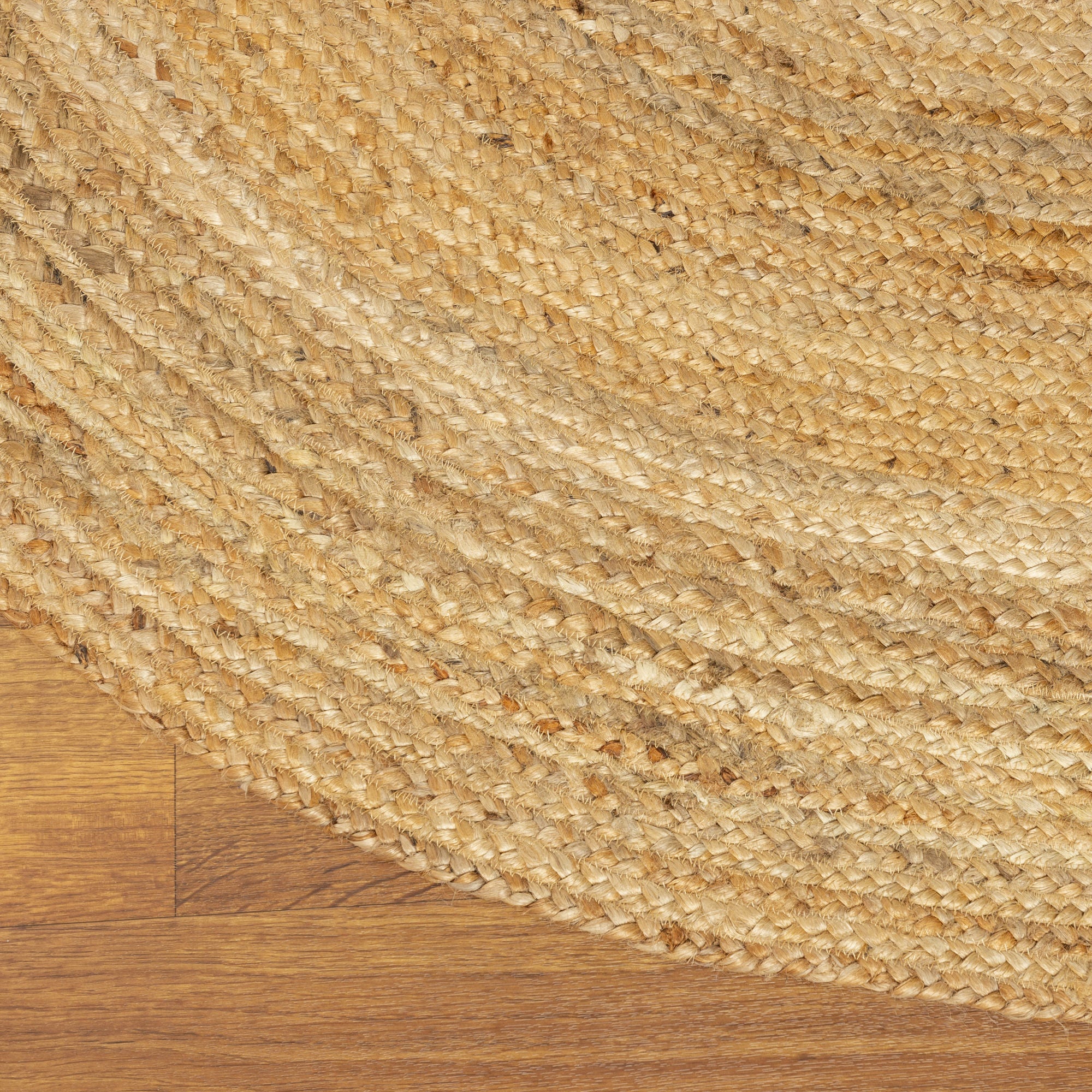 Eco-Friendly Natural Jute Braided Area Rug in Natural #color_natural