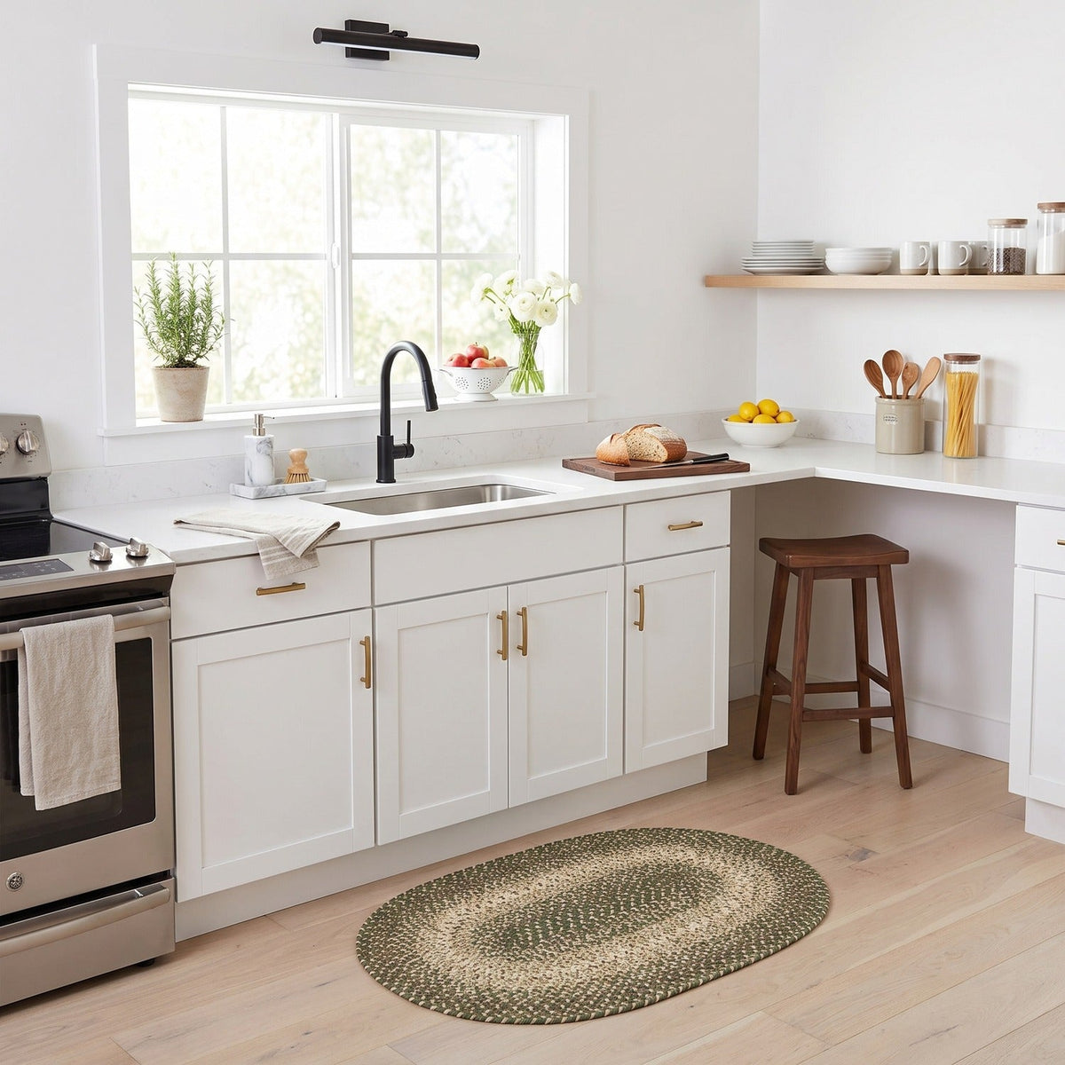 Ridgewood Forest Green washable braided rug, 2x3 oval, in a bright kitchen