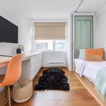 Black Serene Faux Fur Solid Fake Sheepskin Rug