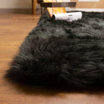 Black Serene Faux Fur Solid Fake Sheepskin Rug