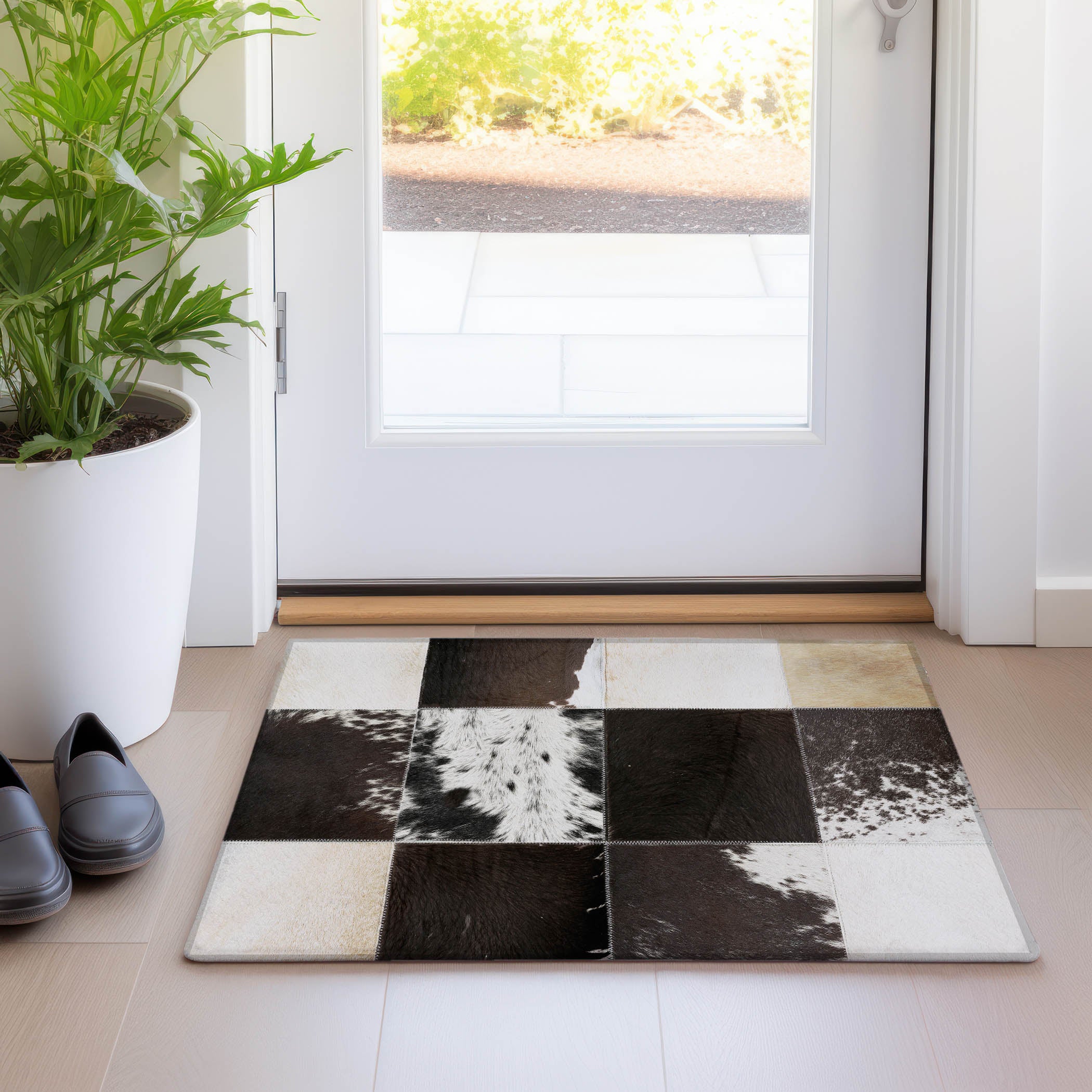 Sintra Machine Washable Cowhide Black Rug 1'8" x 2'6" #shape_Rectangle