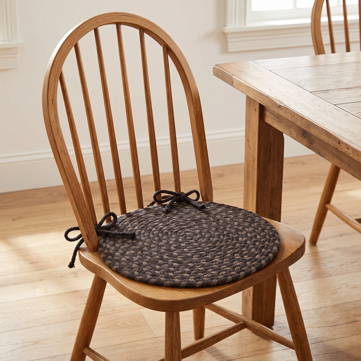 Homespun Braided Chair Pad - Velvet - tied on a wooden Windsor dining chair