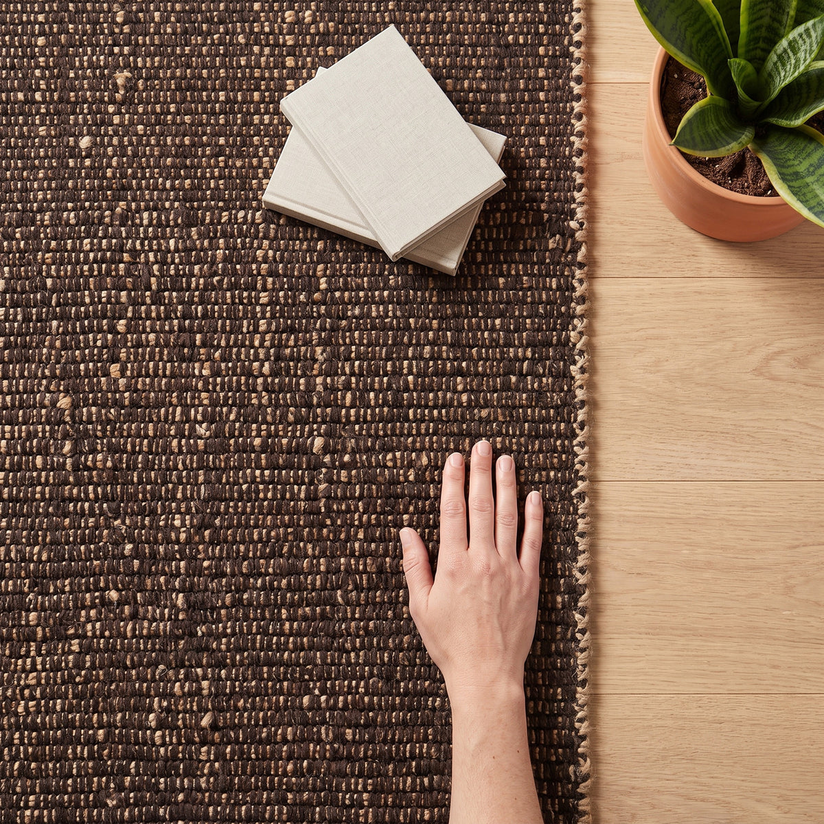 Terra brown jute and cotton rug close-up showing the weave