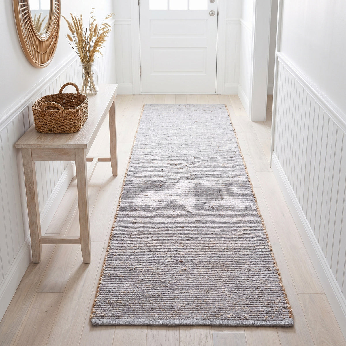Terra light gray jute and cotton runner rug, 2' x 6', in a hallway