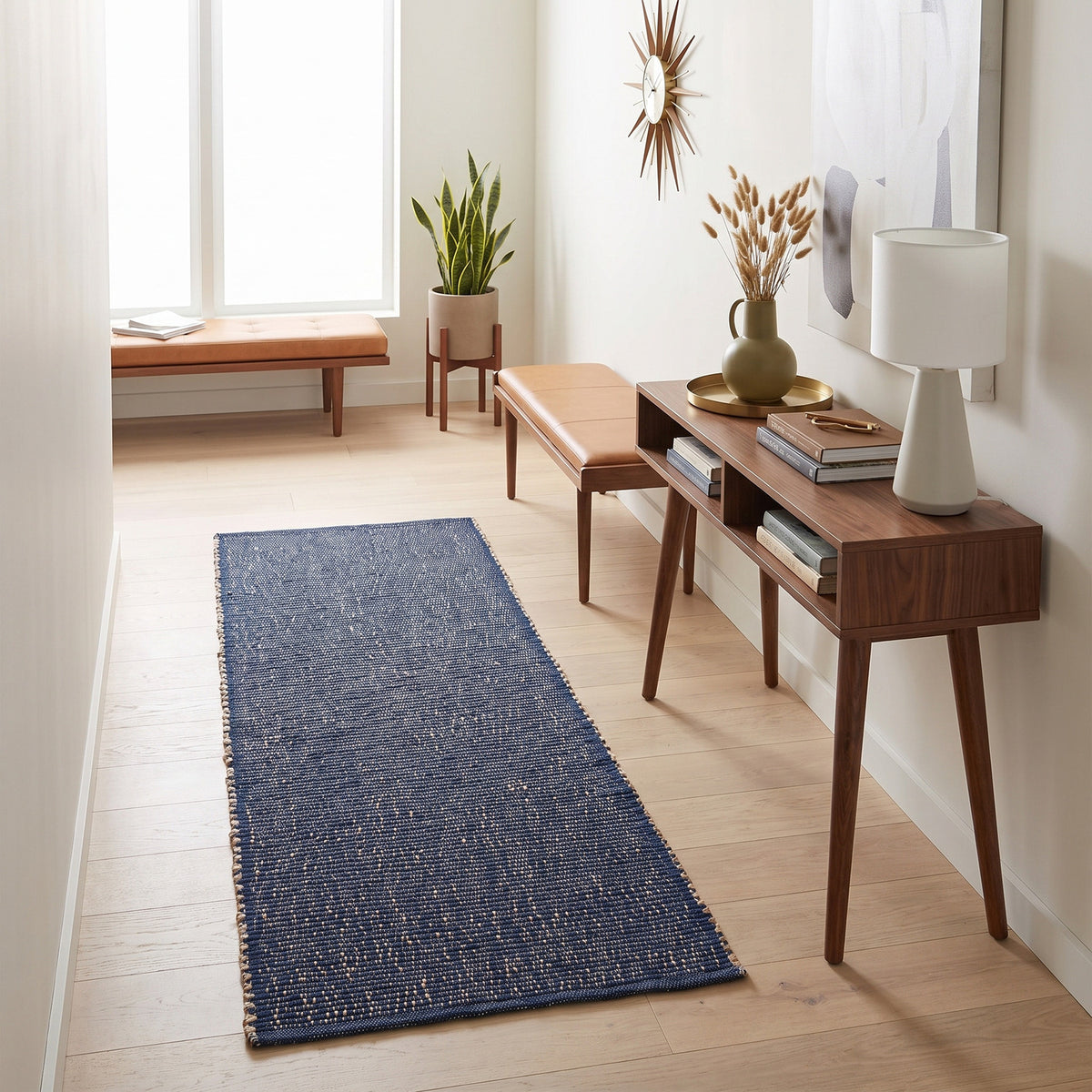 Terra navy jute and cotton runner rug, 2' x 6', in a mid-century modern hallway