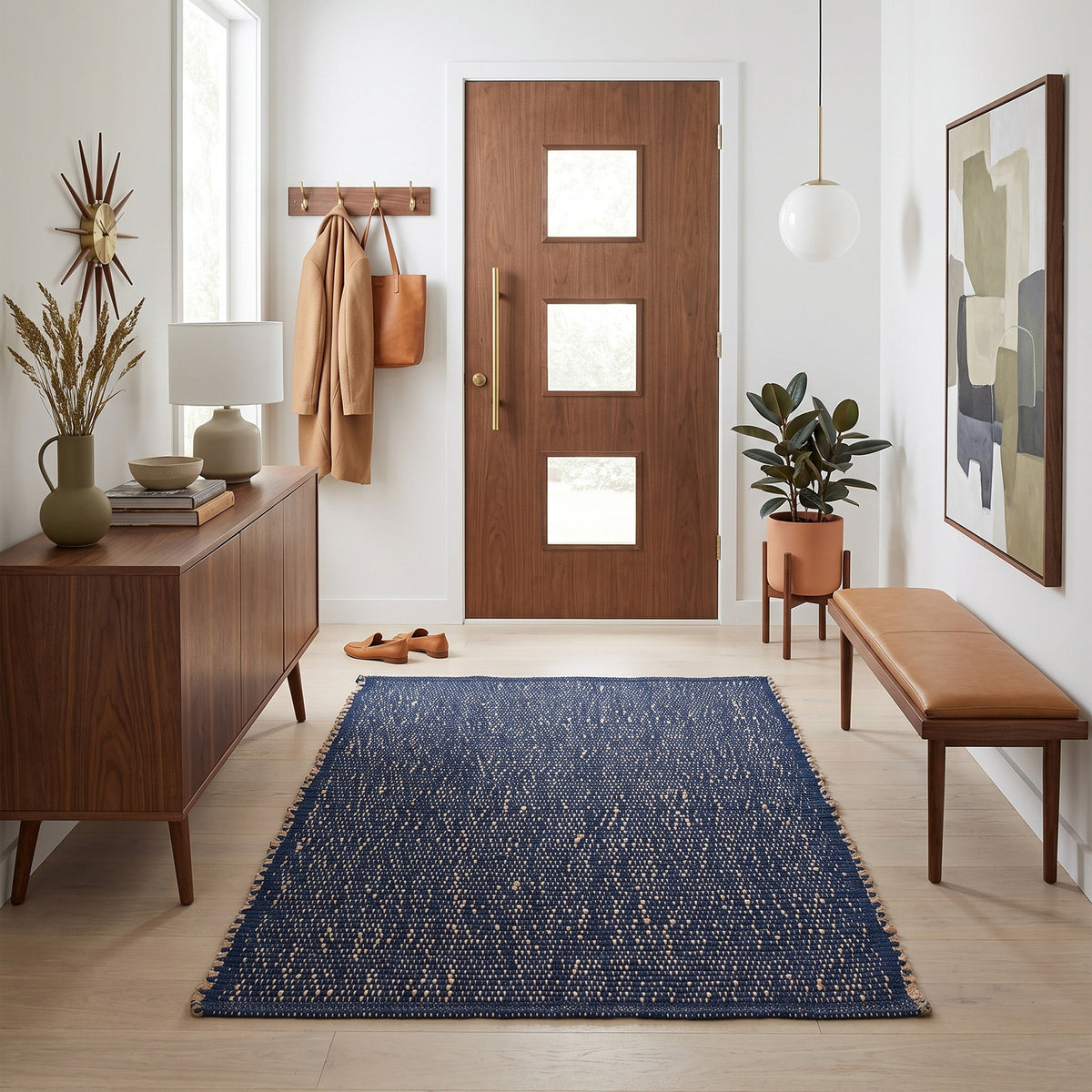 Terra navy jute and cotton rug, 3' x 5', in a mid-century modern front entry