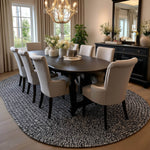 Black, White Braided Indoor Outdoor Polypropylene Rug 7' X 9' #shape_Oval