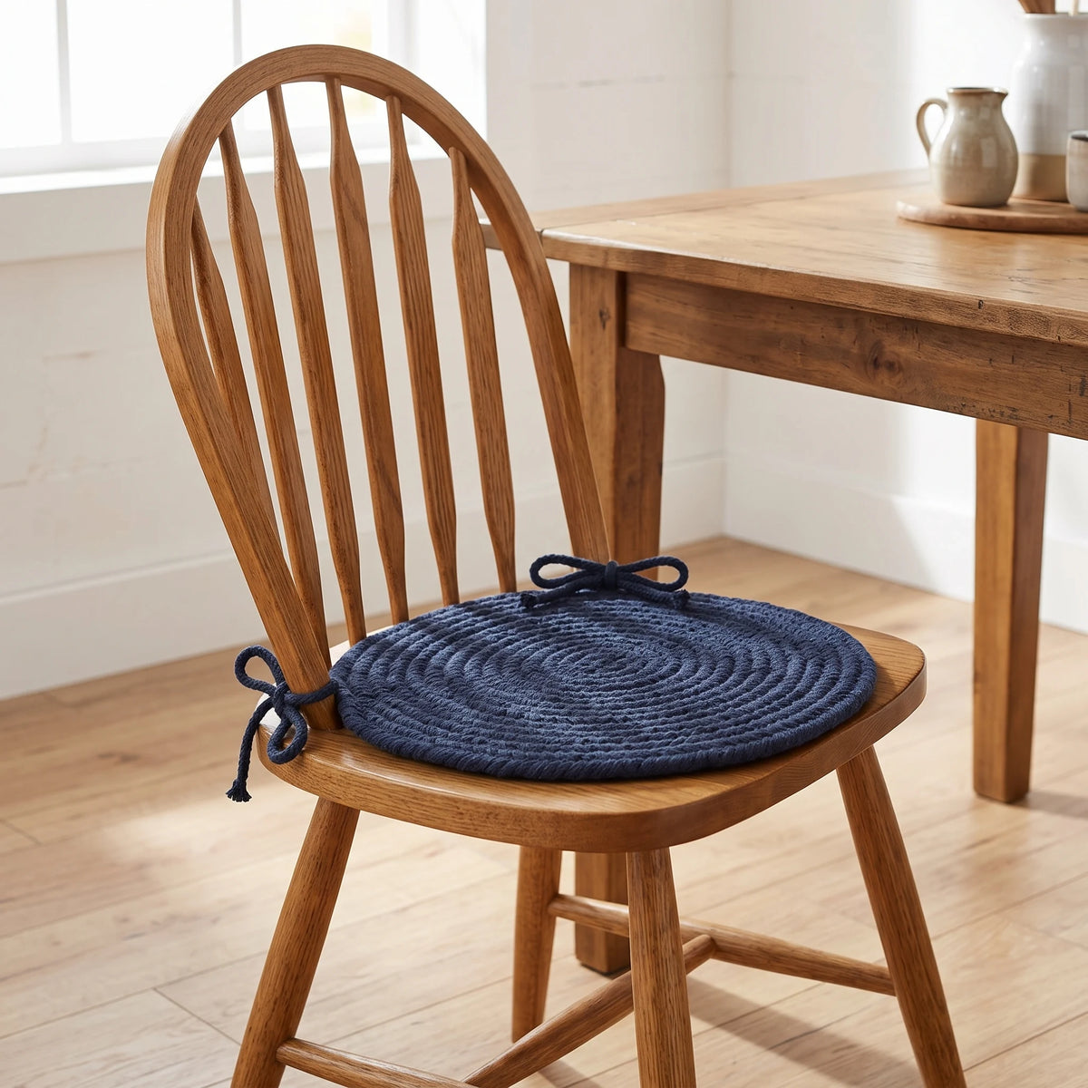 Pura Braided Chair Pad - Navy - tied on a wooden Windsor dining chair
