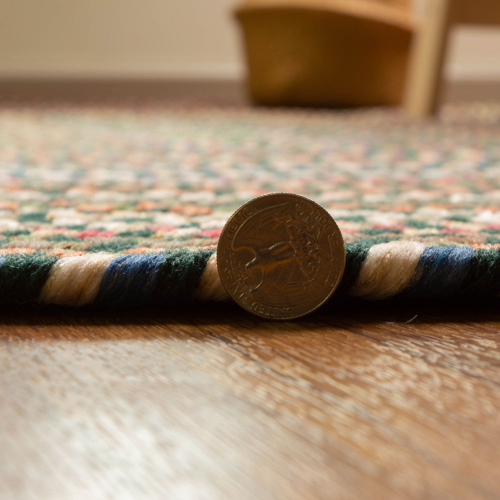Roxbury Spruce Green braided rug, close up of the braided edge