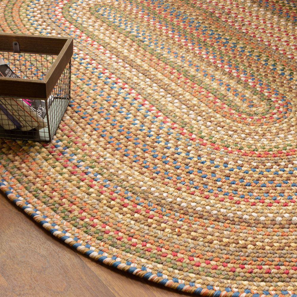 Roxbury Straw Beige braided rug styled in a room setting