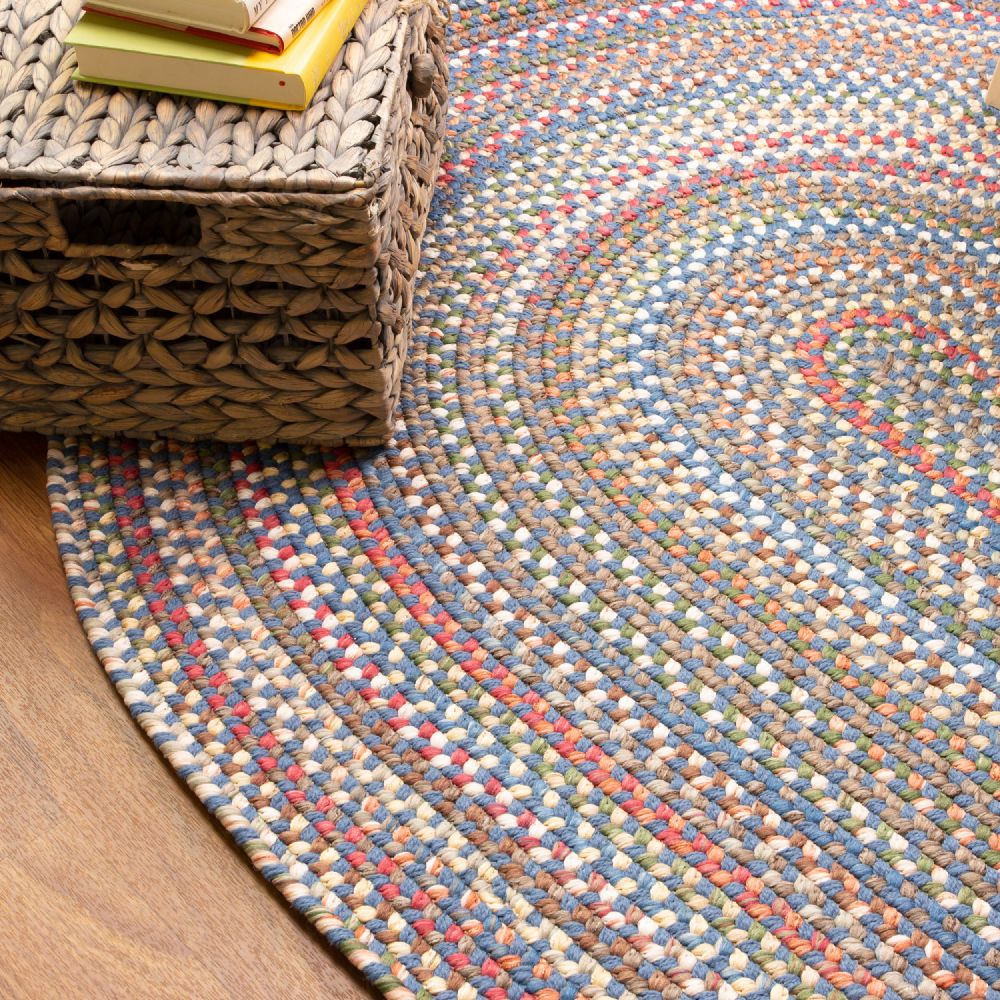 Roxbury Blue braided rug styled in a room setting