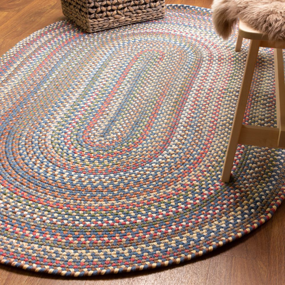 Roxbury Blue braided rug styled in a room setting