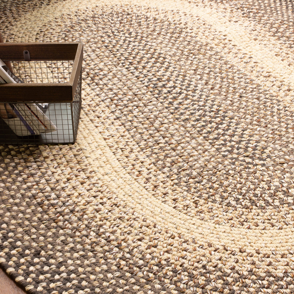Ridgewood brown braided wool rug styled in a farmhouse interior