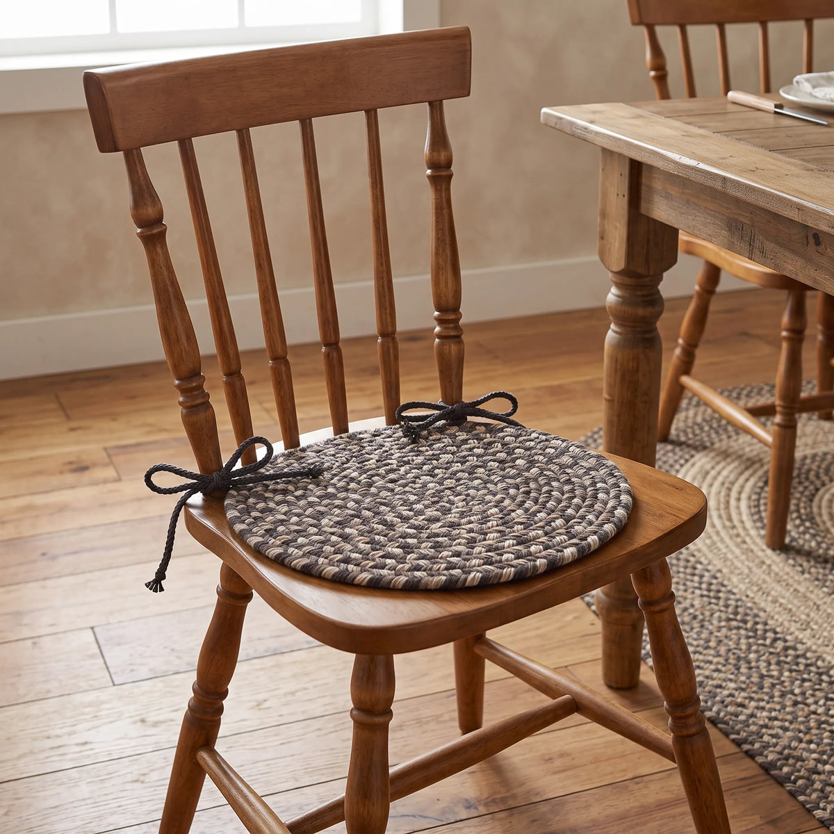 Ridgewood Braided Chair Pad - Brown Velvet - tied on a classic wooden dining chair