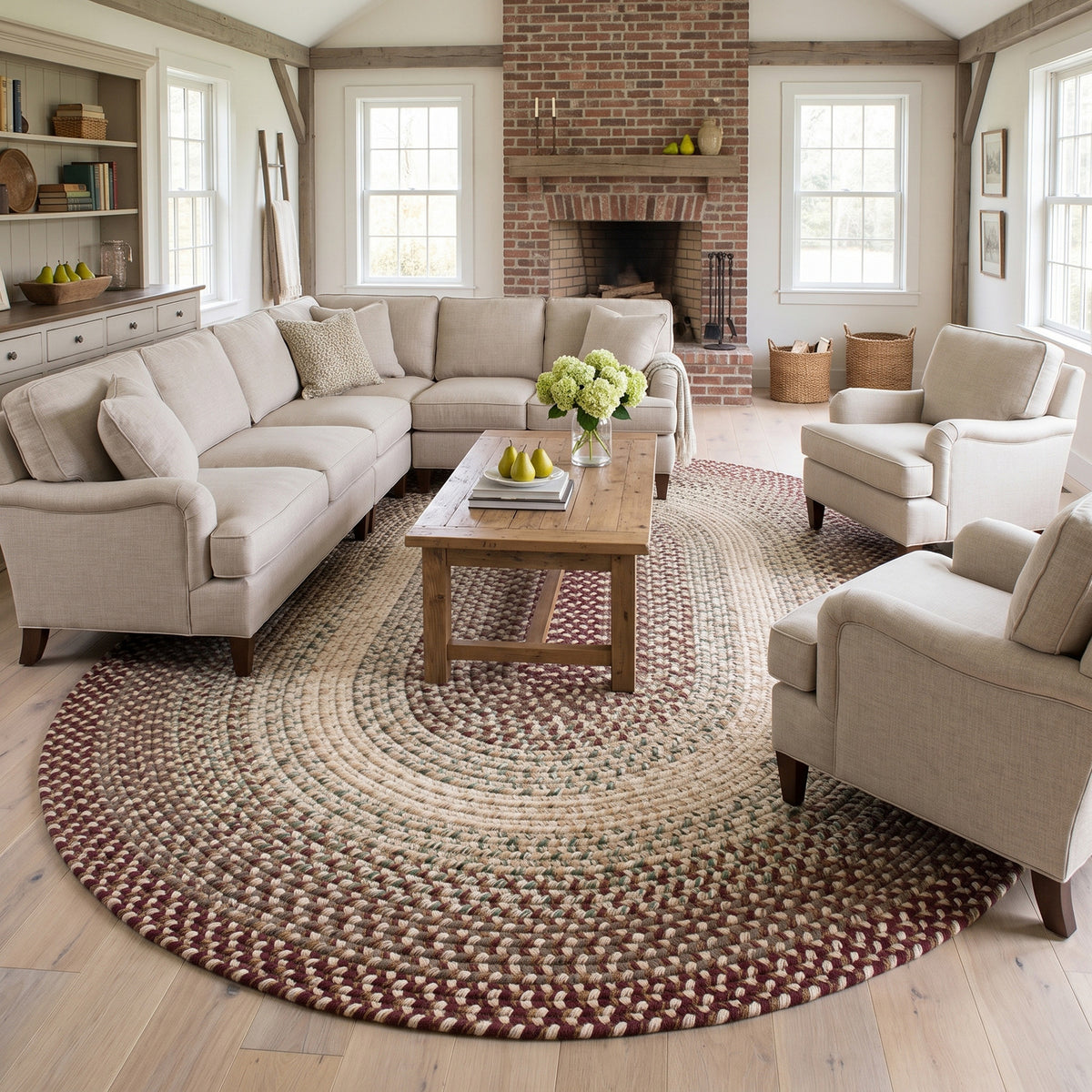 Ridgewood Burgundy braided rug, 10x13 oval under a sectional sofa #Shape_Oval