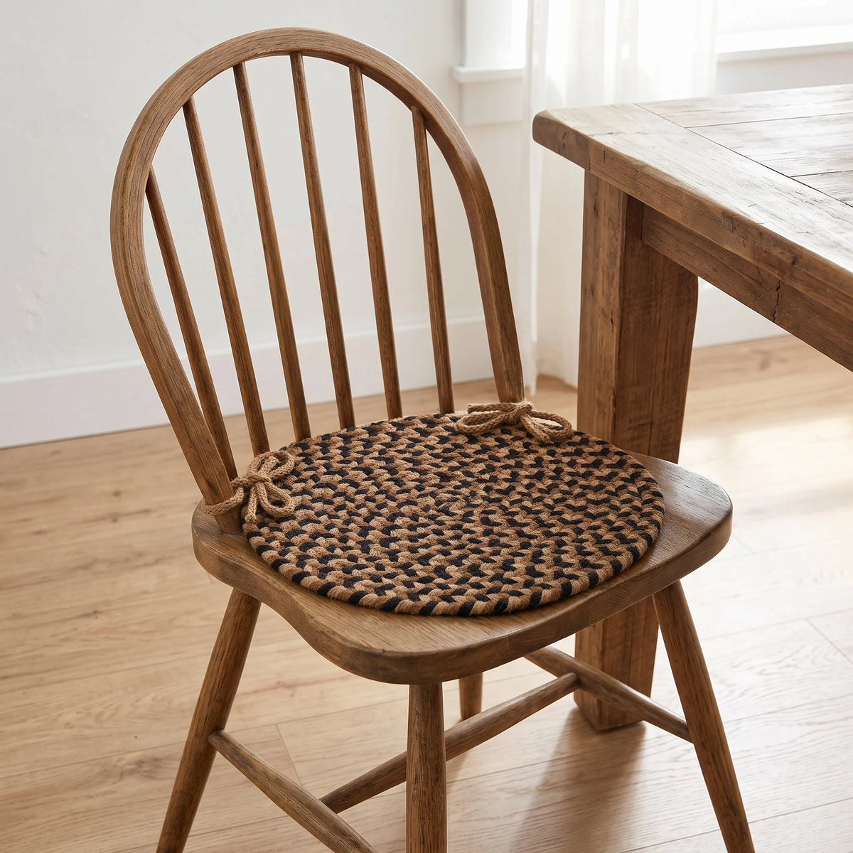 Santa Maria Braided Chair Pad - Natural Earth - tied on a wooden Windsor dining chair