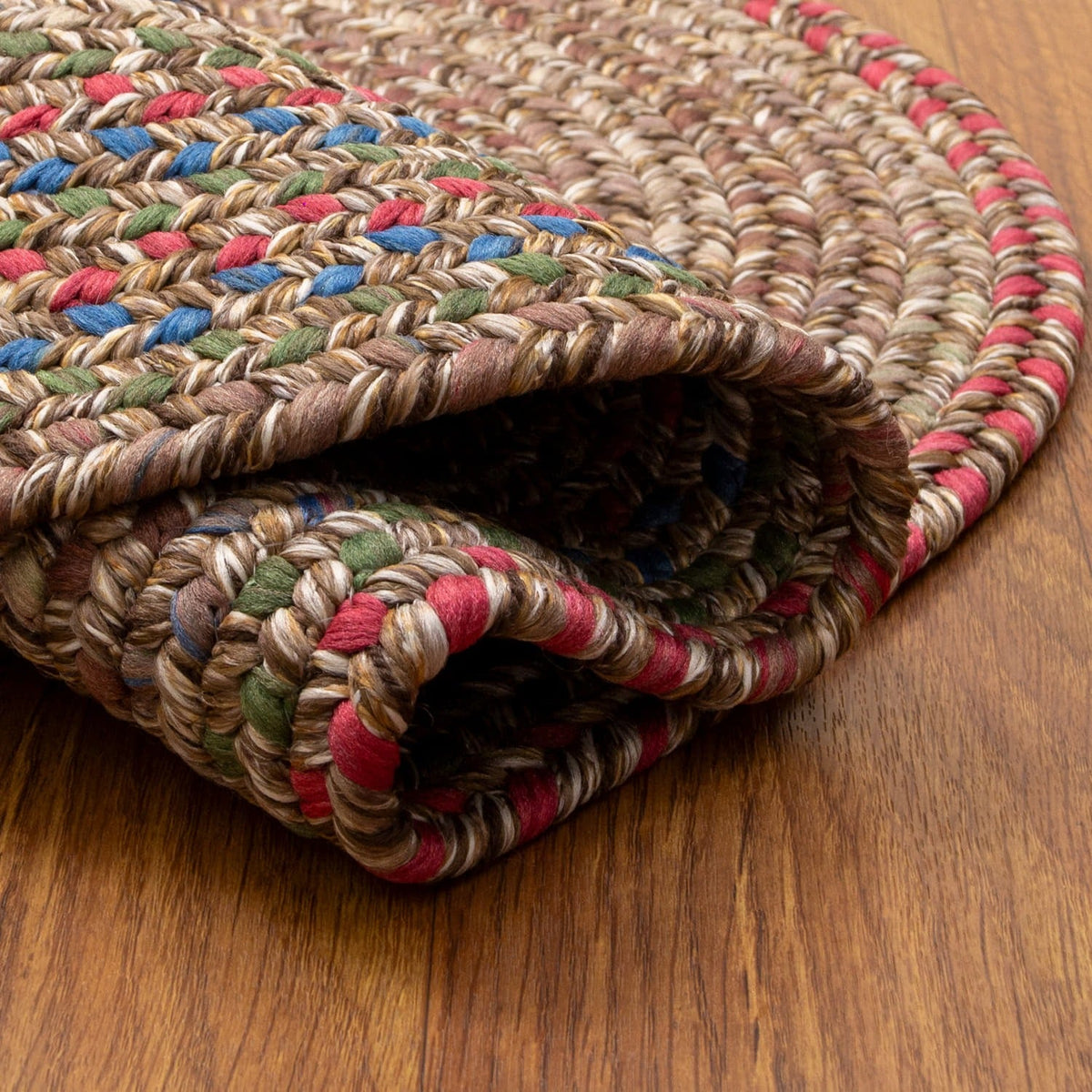 Brown Portsmouth rug folded back to show the reversible underside