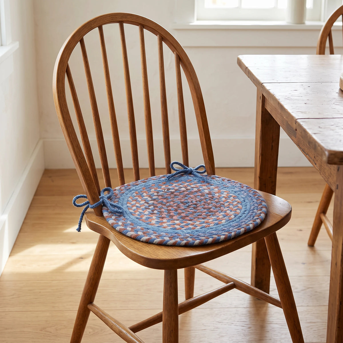 Tribeca Braided Chair Pad - Blue Dragon - tied on a wooden Windsor dining chair