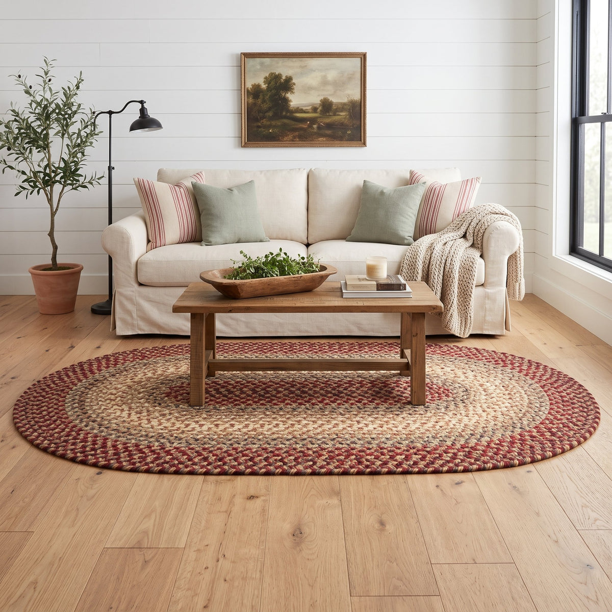 Hartford Spanish Red braided rug, 5x8 oval in a farmhouse living room #Shape_Oval