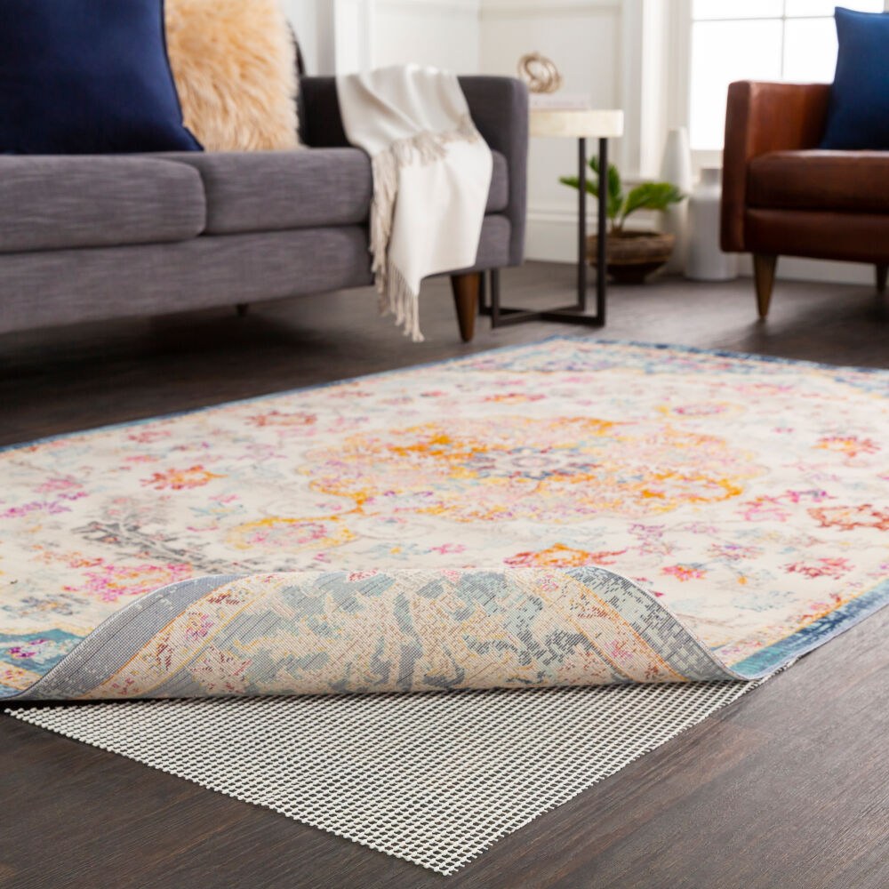 Lock Grip rug pad under an area rug in a living room