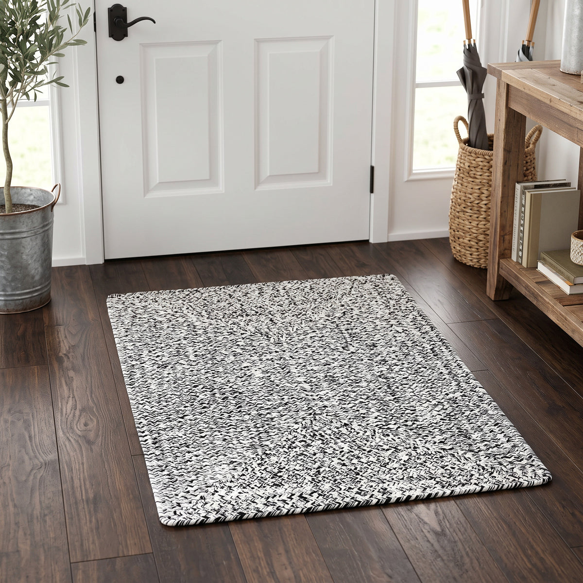 Rustica black and white braided cotton rug, 2x3 rectangle doormat in a farmhouse entryway #size_2' x 3'
