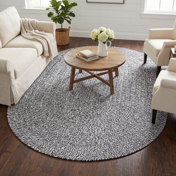 Rustica black and white braided cotton rug, 5x7 oval in a farmhouse living room #size_5' x 7' Oval