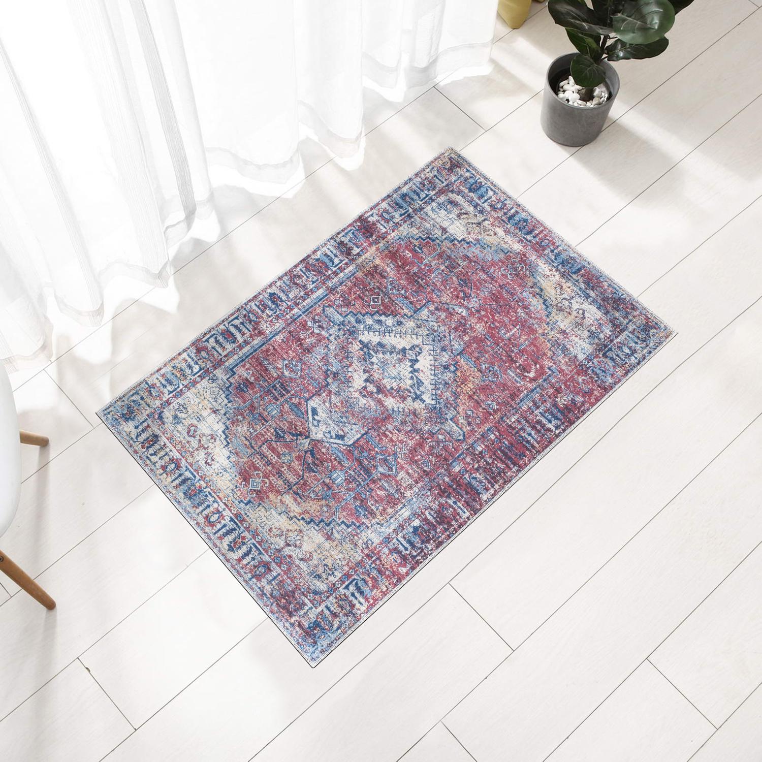 Red Bursa machine washable area rug 2' x 3' - styled in a room