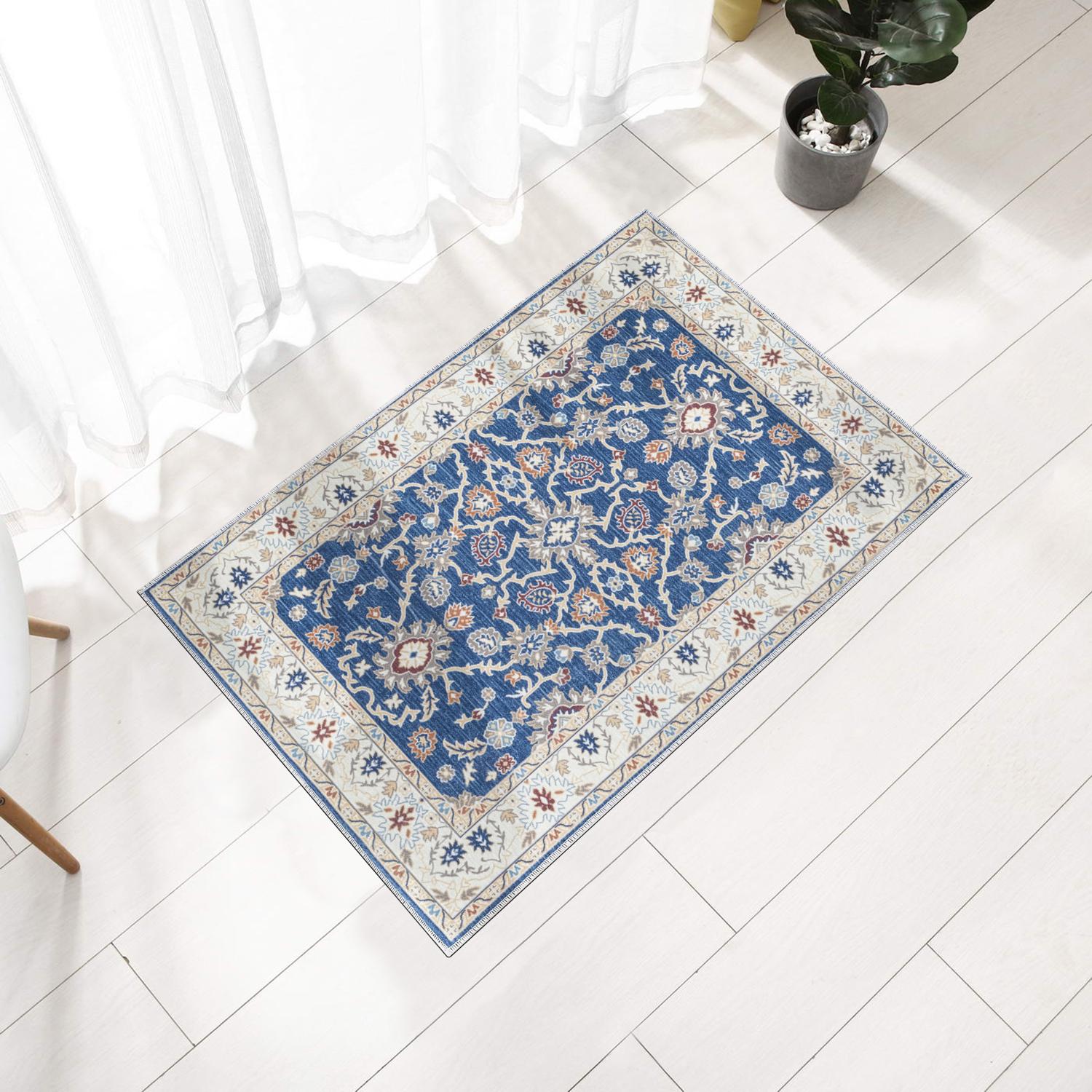 Navy Bursa machine washable area rug 2' x 3' - styled in a room