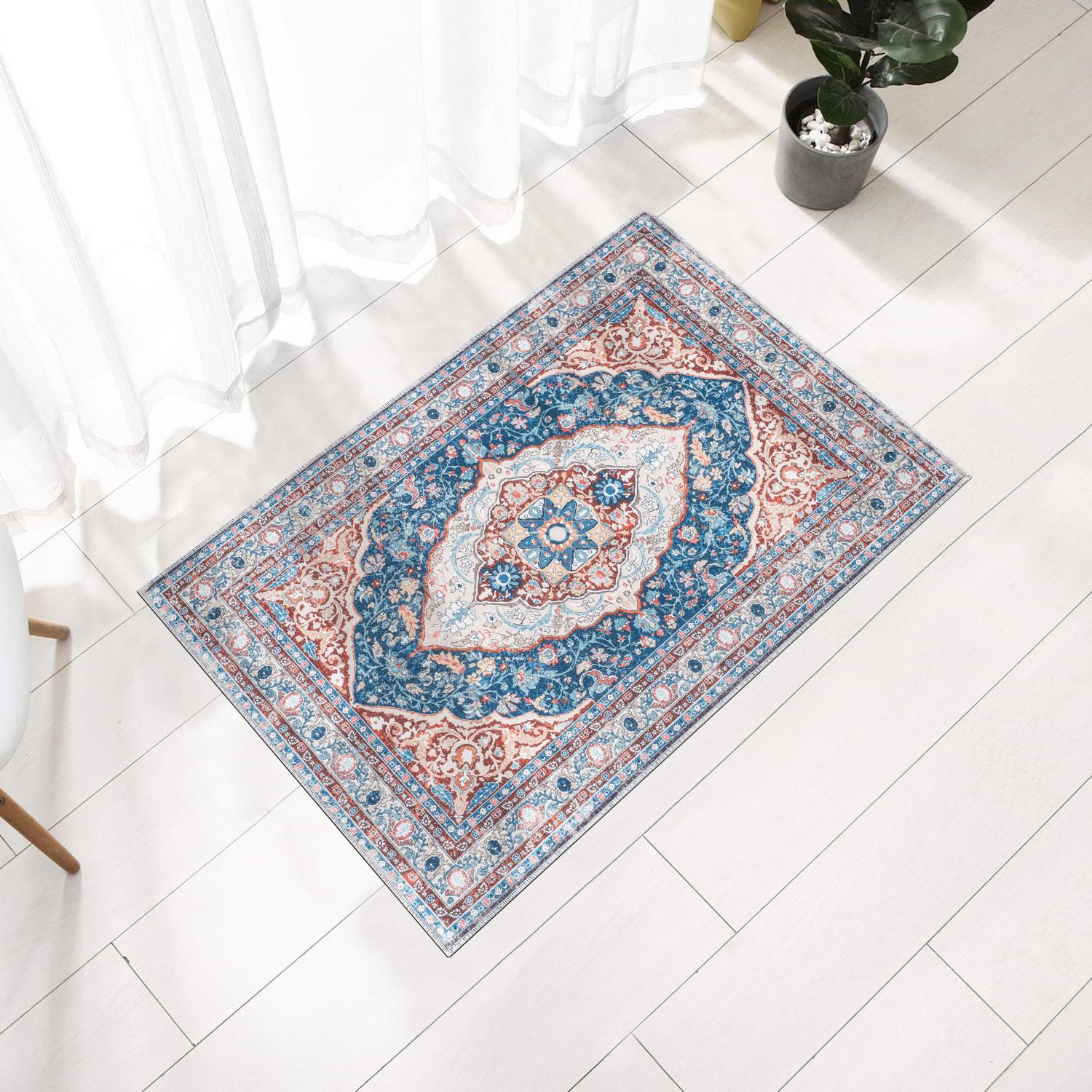 Peach Bursa machine washable area rug 2' x 3' - styled in a room